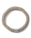 Less campy. More covet-wothy. Links of London's effervescent silver style lends a friendly edge to an it-girl's wrist.