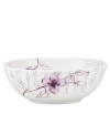 Blur the line between garden style and modern design with the Watercolors Amethyst bowl. Purple blossoms flourish against a playful dot pattern while the white coupe shape couples the sleek look and unparalleled durability of bone china. Qualifies for Rebate