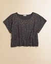 Reminiscent of a starry night, this sequin-embellished crop top is out of this world.ScoopneckShort sleevesPullover styleCropped hem95% viscose/5% spandexHand washImported