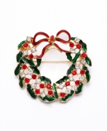 Add a cheerful touch of Christmas to your favorite blazer or blouse, Charter Club's festive wreath brooch spells holiday spirit! Brooch is crafted in gold tone mixed metal with sparkling clear and red crystals combined with red and green enamel accents. Item comes packaged in a signature gift box. Approximate diameter: 2 inches.