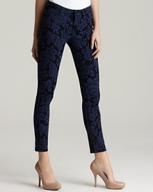 An elaborate floral print puts spring in the step of these GUESS skinny jeans.