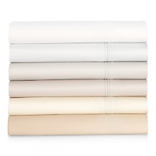 From 500-thread count sateen woven of the finest pima cotton, this Barbara Barry king flat sheet is adorned with a crisp triple pleat at the cuff. In a new array of modern colors, Pintuck Sateen lends luminous elegance to your bedding repertoire.