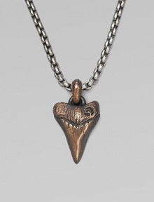 A shark's tooth pendant is handsomely craft, lending to lend a new look to any man's collection. From the Small Amulet Collection Titanium Bronze 2.7mm box chain length, 22 Lobster clasp Imported 