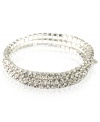 Every girl loves a little glamour. This gorgeous Givenchy bracelet features three rows of round-cut crystal set in silver tone mixed metal. Bracelet stretches to fit wrist. Approximate diameter: 2-1/4 inches.