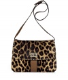 Luxurious bag of textured, brown-patterned calfskin with classic leopard print look - Classic handbag shape - Cool studded edging - Bulbous shape, flap, toggle clasp, long shoulder strap and convenient interior pockets - Try with sexy leather pants, or an elegant sheath dress