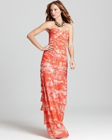 Elegant and individual, this BCBGMAXAZRIA strapless gown is set apart from the crowd with a vibrant print.