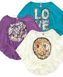 Keep her feeling groovy in one of these sparkly graphic shirts from Beautees.