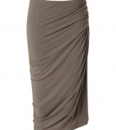 Luxurious skirt made ​.​.of fine, taupe rayon stretch - Crazy elegant with decorative draping - Fashionable wrap look - A mega glamorous version of the classic pencil skirt - Cut body-hugging, the hem ends at the knee - Super chic, super sexy, a dream of a skirt for women who know what they want - A smashing piece for business and important parties or events - In the office with an elegant blouse and pumps, in the evening with a sexy top and gladiator sandals