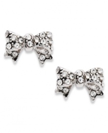 Wrap up your look with these darling bow studs from Juicy Couture. Shimmering pave crystals take the look to a gorgeous new level. Crafted in silver tone mixed metal. Approximate diameter: 1/2 inch.