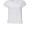 Sweet, delicate top in crisp white cotton is the perfect piece for summer fun - Romantic embroidered eyelets create a soft, feminine look that is polished but relaxed - Design features gentle scoop neck, cap sleeves and straight silhouette - Style for the office with a pencil skirt, cashmere cardigan and heels, or on the weekend with a breezy skirt, capris or cuffed denim shorts, and favorite flat sandals