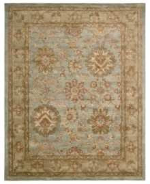 For the Jaipur collection Nourison uses a unique herbal wash to create the silky sheen and antique appearance of these fine wool rugs. In stunning aqua with blooms and vines aplenty, the rug enhances your home with lavishly elegant style.