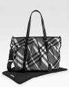 With the look of a classic tote, this check bag holds everything your baby needs in sophisticated Burberry style. Double handles, 10 drop Adjustable, detachable shoulder strap, 22 drop Top zip closure Outside open pouches Inside zip and open pockets Removable changing mat 17W X 13H X 6D PVC Imported