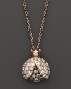 Brown and white diamonds set in a 14K. rose gold ladybug pendant.