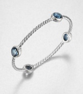 From the Renaissance Collection. Let this beautiful piece take you back in time with faceted London blue topaz stations on an iconic sterling silver cable design. London blue topazSterling silverDiameter, about 2.25Slip-on styleImported 