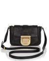 Embrace your inner utilitarian with this leather crossbody bag from MICHAEL Michael Kors.