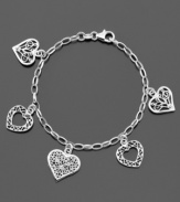 Embrace a charm bracelet full of heart. Features intricate heart-shaped charms. Crafted in sterling silver by Giani Bernini. Approximate length: 7-1/2 inches.