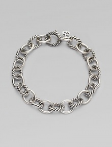 Alternating smooth and cable links create a bracelet that's both classic and of-the-moment with true Yurman style. Sterling silver Length, about 7¼ Spring ring clasp Imported