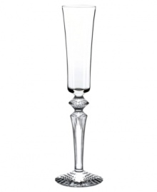 Baccarat's meticulous craftsmanship shines through in this Mille Nuits Flutissimo flute. Strong lines and a beveled base in weighty crystal lend bold, effortless elegance to every occasion.