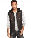 Layer up in sleek style with this quilted vest by INC International Concepts.