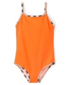 In bright cadmium orange, this one-piece Burberry swimsuit adds vibrant poolside style to adventurous afternoons.