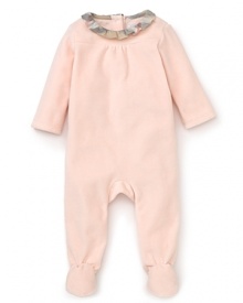 A pajama onesie from Burberry, crafted in the softest cotton velour to ensure comfortable little ones.