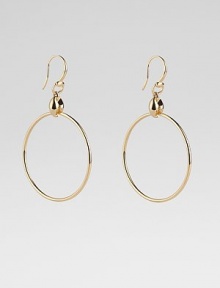 From the Marina Collection. A polished, tubular hoop suspends from a distinctively sculpted link. 18k yellow gold Diameter, about 1½ Ear wire Made in Italy