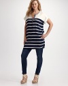 For casual chic, layer on this striped topper edged in crisp denim trim.Crewneck Rolled short sleeves Button-front placket Shirttail hem About 35 from shoulder to hem 100% rayon Dry clean Made in USA