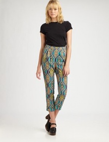 Sophisticated pleats, high rise and a vivacious tribal print define these cropped, crepe de chine pants. Side zipperSlash pocketsRise, about 12Inseam, about 25Fully linedPolyesterDry cleanMade in USA of imported fabricModel shown is 5'10 (177cm) wearing US size 2.