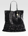 Shine from day to night with this roomy sequined tote bag, featuring bottom ruffles and smooth leather handles. Double leather top handles, 7 dropMagnetic snap closureOne inside zip pocketCotton lining13¼W X 14½H X 2DMade in Italy