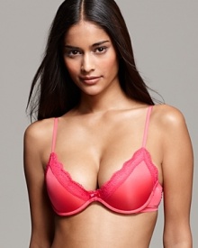 A pretty push-up bra with delicate scalloped lace trim and a low scoop neckline, perfect for lower cut tops and dresses.