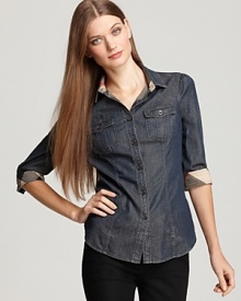 Classic cool abounds in this Burberry Brit chambray shirt, an iconic staple that stands the test of time.