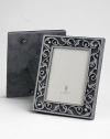 A stunning gift or keepsake made only for the most treasured photographs, crusted with faceted Swarovski crystals and freshwater pearls. Arrives in a gift box Accommodates a 8 X 10 photograph Overall: 10½ X 12½ Imported 