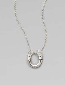 A white sapphire adorned pendant on a delicate chain. White sapphires Sterling silver Length, about 18 Pendant size, about ¾L X ½ W Lobster clasp Imported 