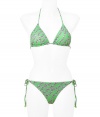 Add instant chic to your swim-ready style with this adorable bikini from Diane von Furstenberg - Classic triangle top with back dual tie closure, bottoms with side tie detail, all-over floral print - Pair with a sheer caftan, wedge heels, and a floppy sun hat