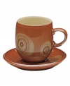 Add a whimsical touch to the casual table with the large Chilli mug from Denby's Fire dinnerware. The dishes have a mod circle design in natural green and warm terra cotta hues that create a contrasting yet coordinated look.