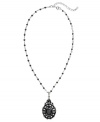 Old-world style meets modern glam in this Monet necklace. In jet crystal accents and hematite-plated mixed metal. Approximate length: 16-18 inches. Approximate drop: 1-1/2 inches.