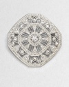 A lacy medallion formed of radiant crystals and cubic zirconia stones twinkles every which way.Crystal and cubic zirconiaRhodium platingDiameter, about 1¾Pin backImported