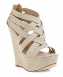 Exceptional beauty. Steve Madden Women's Xcess platform wedge sandals take caged vamps and wedge heels to new heights. And the results are amazing.