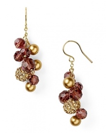 A cluster to covet, Carolee's drop earrings add autumnal texture. When fall sets in, slip them in to complement your coziest cashmere.