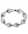 Twinkle, twinkle. Glittering glass accents and sparkling crystals are the stars of this fashionable flex bracelet from Givenchy. Set in silver tone mixed metal. Approximate length: 7-1/4 inches.