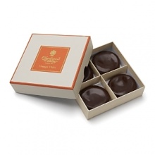 Thin discs of dark chocolate infused with the delicate taste of orange.