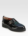 Traditional wool tartan freshens this patent leather design, with an adjustable monk strap and rubber sole for added traction. Patent leather and wool tartan upperAdjustable buckle strapLeather liningRubber solePadded insoleImported