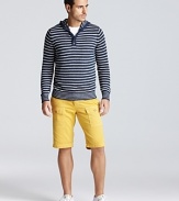 Narrow stripes lend a modern nautical appeal to this handsome hooded henley from Vince.