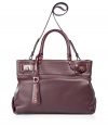 Luxurious bag in rich oxblood leather - Extremely high quality craftsmanship you can absolutely see - Stylish, roomy satchel (shopper) shape with one short carry handle and a long shoulder strap - Classy, gold-colored turn-key closures - Accent stitching adds a modern cool - A fantastic upgrade for simple  business and daytime looks