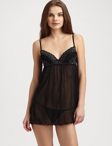 Contrast embroidered lace cups and an alluring mesh body create a sophisticated after dark ensemble, teamed with a sexy G-string.Adjustable twin shoulder straps Padded cups with embroidered lace overlay Elastic Empire waist Mesh body Lettuce edged hem Matching G-string About 27, from shoulder to hem Babydoll: 80% polyamide/16% elastane/4% viscose G-string: 98% polyamide/2% cotton Hand wash Made in Italy