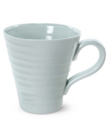 From celebrated chef and writer, Sophie Conran, comes incredibly durable dinnerware for every step of the meal, from oven to table. A ribbed texture gives this mug the charming look of traditional hand thrown pottery. Shown in white.