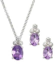 Introducing rich, jewel tone hues! Victoria Townsend's beautiful drop earrings and matching pendant feature oval-cut amethyst (2-9/10 ct. t.w.) topped with a trio of sparkling diamond accents. Crafted in sterling silver. Approximate length: 18 inches. Approximate drop (pendant): 1/2 inch. Approximate drop (earrings): 1/2 inch.