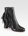 Channel 70's-era vibes wearing this leather ankle boot with playful fringe and a convenient side zip. Stacked heel, 2¾ (70mm)Leather upperSide zipLeather liningSignature red leather solePadded insoleMade in Italy