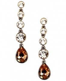 Simply stunning. Givenchy's brown gold-plated mixed metal earrings feature sexy smoky quartz-colored glass stones. Approximate drop: 2-1/4 inches.