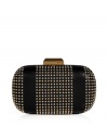 Inject edgy-luxe appeal to your black tie or evening looks with this round frame studded clutch from Emilio Pucci - Round hard frame, brass-tone logo snap top closure, stud detailed panels on leather, patterned silk lining - Pair with a floor-sweeping evening gown and metallic